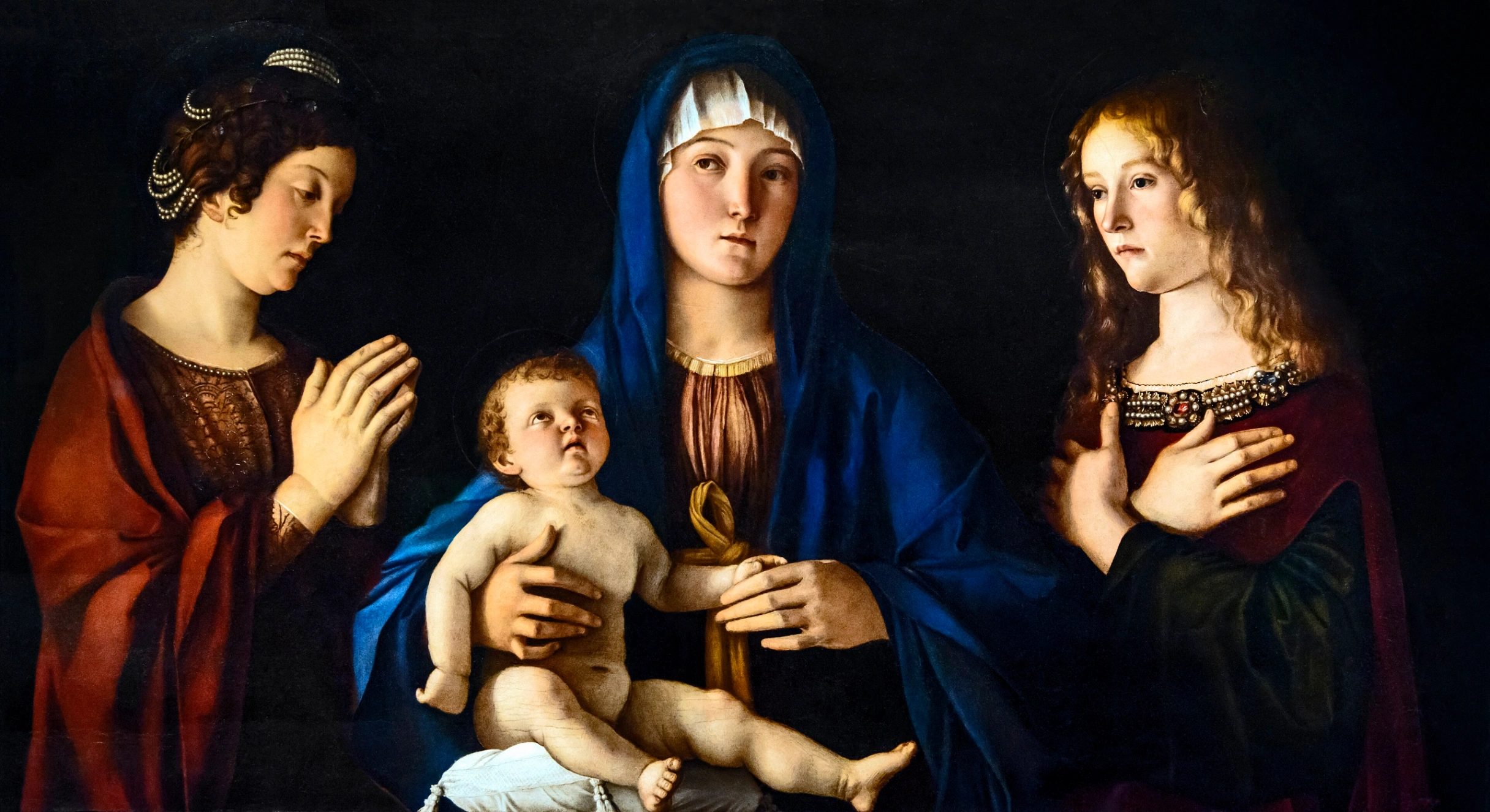 Giovanni Bellini, Madonna con Bambino tra Santa Caterina e Maria Maddalena, 1490 circa, olio su tavola, 58 × 107 cm, Gallerie dell'Accademia, Venezia.