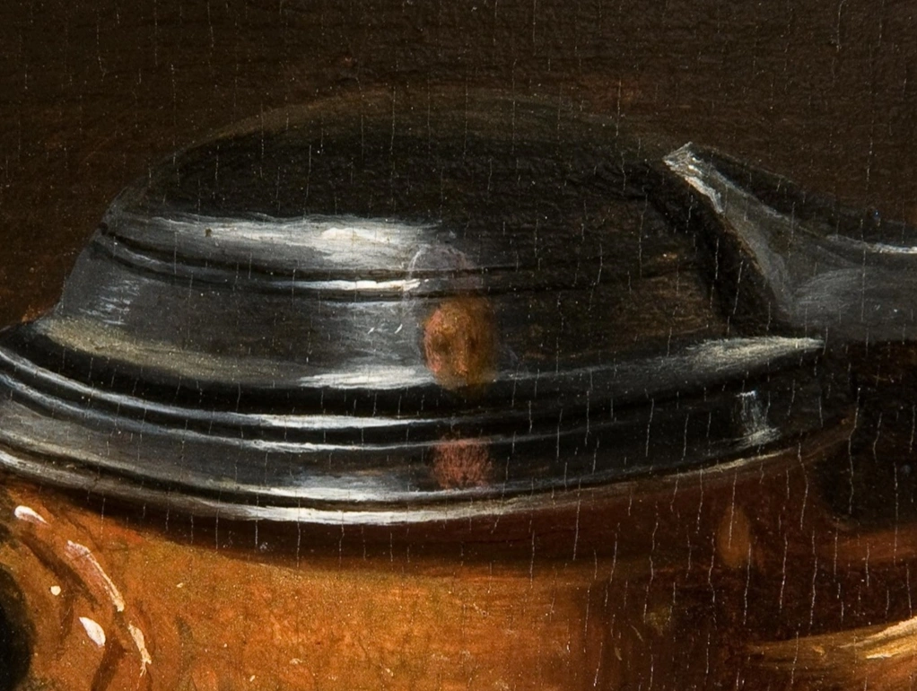 Clara Peeters, Natura morta con formaggi, mandorle e pretzel, 1615 circa, 34,5 × 49,5 cm, Mauritshuis, L'Aia. Dettaglio dell'autoritratto della pittrice.