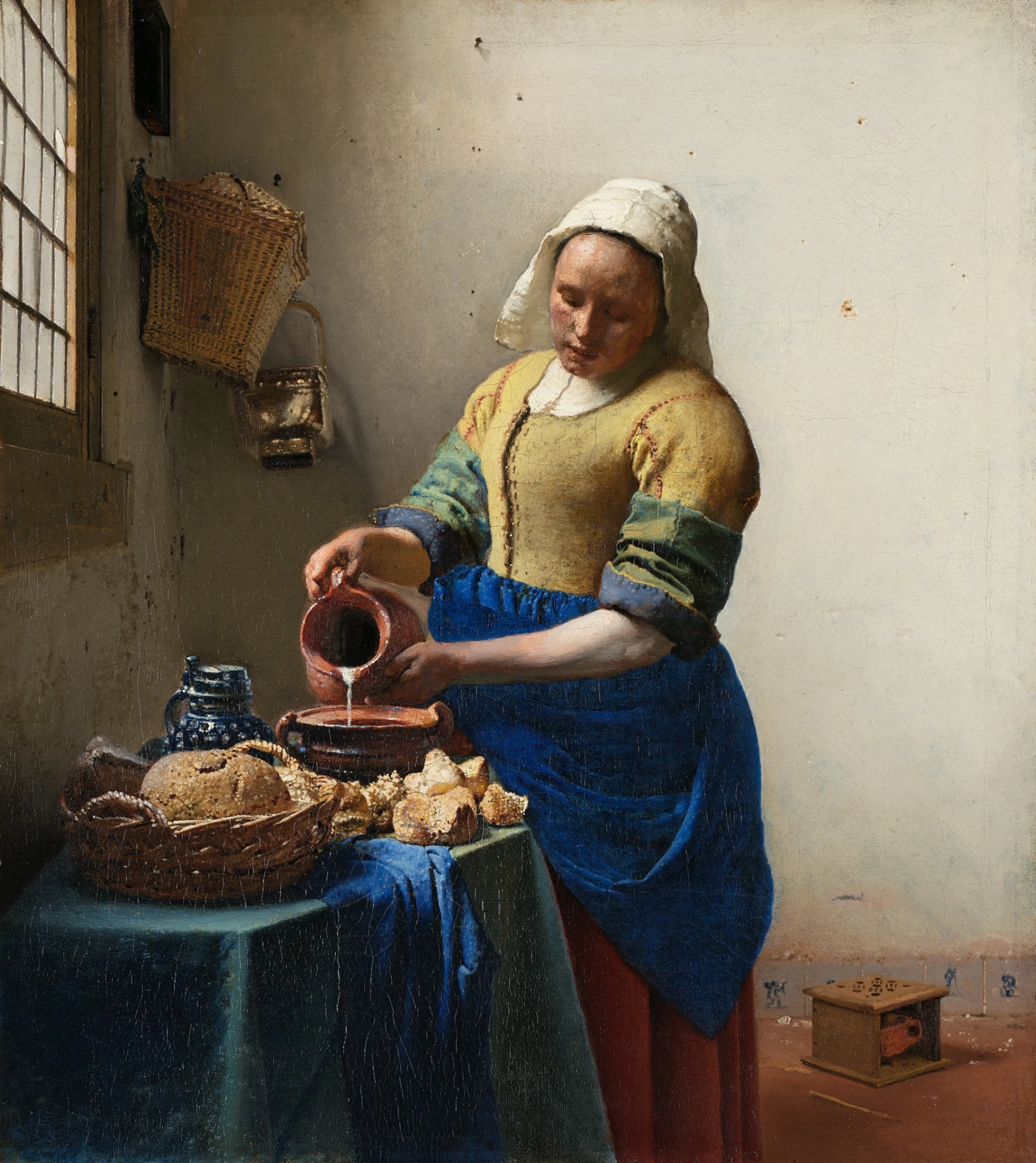 Johannes Vermeer, La lattaia, 1660 circa, olio su tela, 45,5 x 41 cm, Rijksmuseum, Amsterdam.