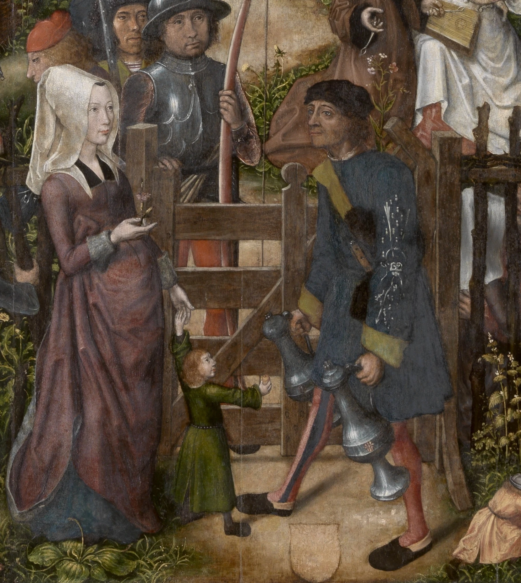 Dettaglio di una famiglia, che partecipa alla festa.