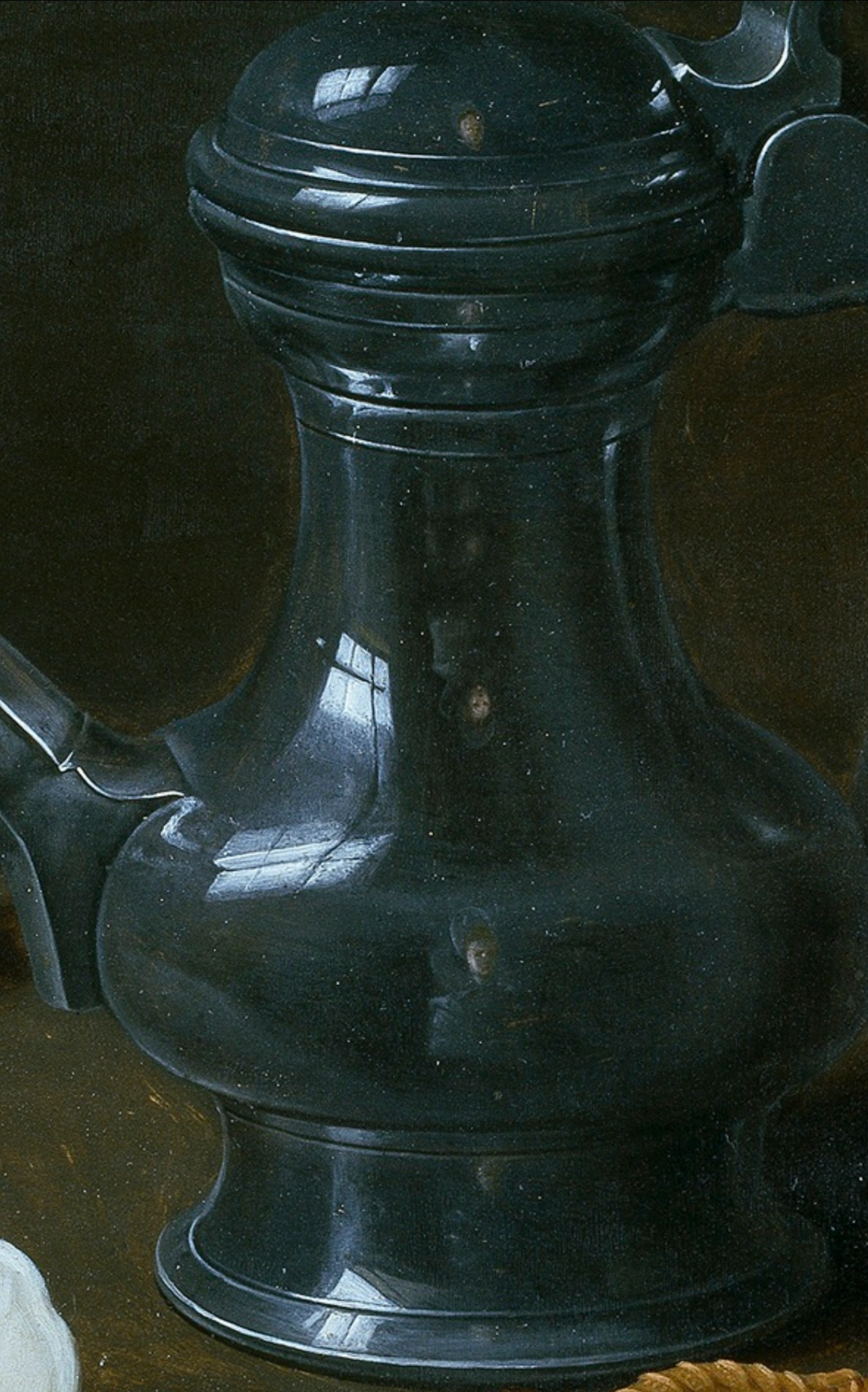 Clara Peeters, Natura morta con fiori, calice e prelibatezze, 1611, olio su tavola, 52 x 73 cm, Museo del Prado, Madrid. Dettaglio del riflesso con autoritratto.