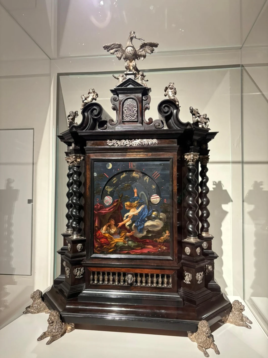 Paolo Gerolamo Piola, Orologio notturno raffigurante Diana (o l'Allegoria della Notte?), fine del XVII secolo - inizi del XVIII secolo, cassa in legno intagliato e tinto color ebano, argento sblazato e cesellato, mostra in rame dipinto a olio, collezione privata.
